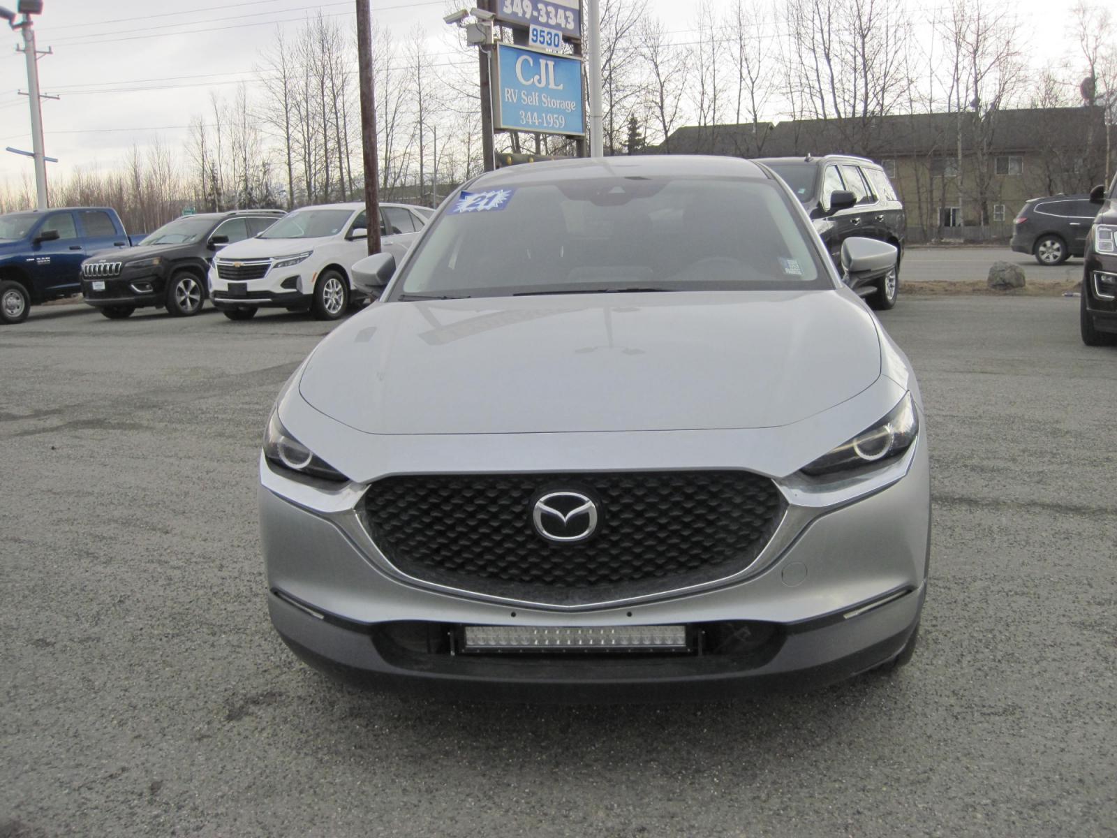 2021 silver /black Mazda CX-30 select AWD (3MVDMBBL3MM) with an 2.5L L4 DOHC 16V engine, 6A transmission, located at 9530 Old Seward Highway, Anchorage, AK, 99515, (907) 349-3343, 61.134140, -149.865570 - Photo #2